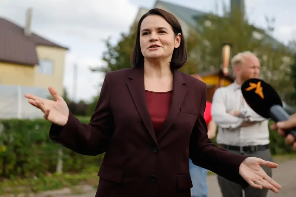Belarus’ opposition politician Sviatlana Tsikhanouskaya gestures as she speaks to...