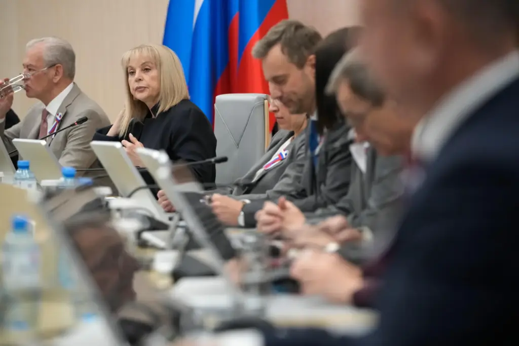 Ella Pamfilova and members of the Russian Central Election Commission attend a news conference.