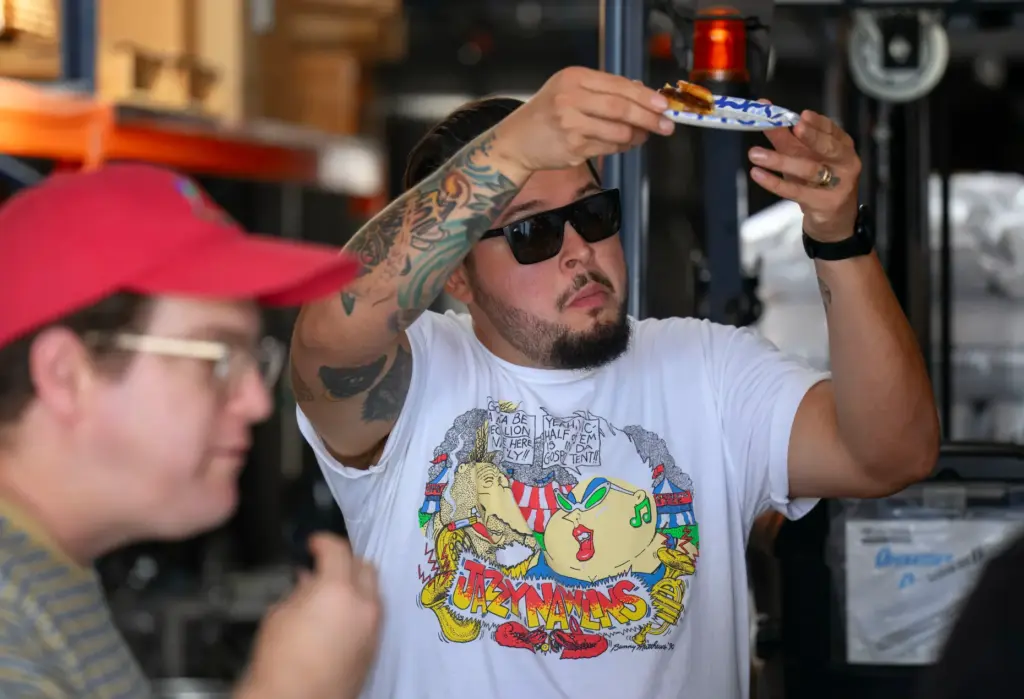 Pablo Romero-Estevez evaluates a burger during judging for the Best...