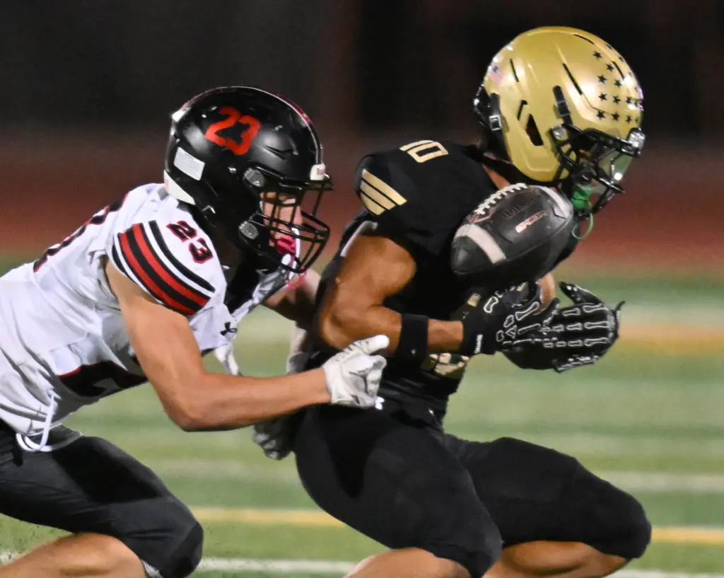 Micah Samson #10 of El Dorado can not hold onto...