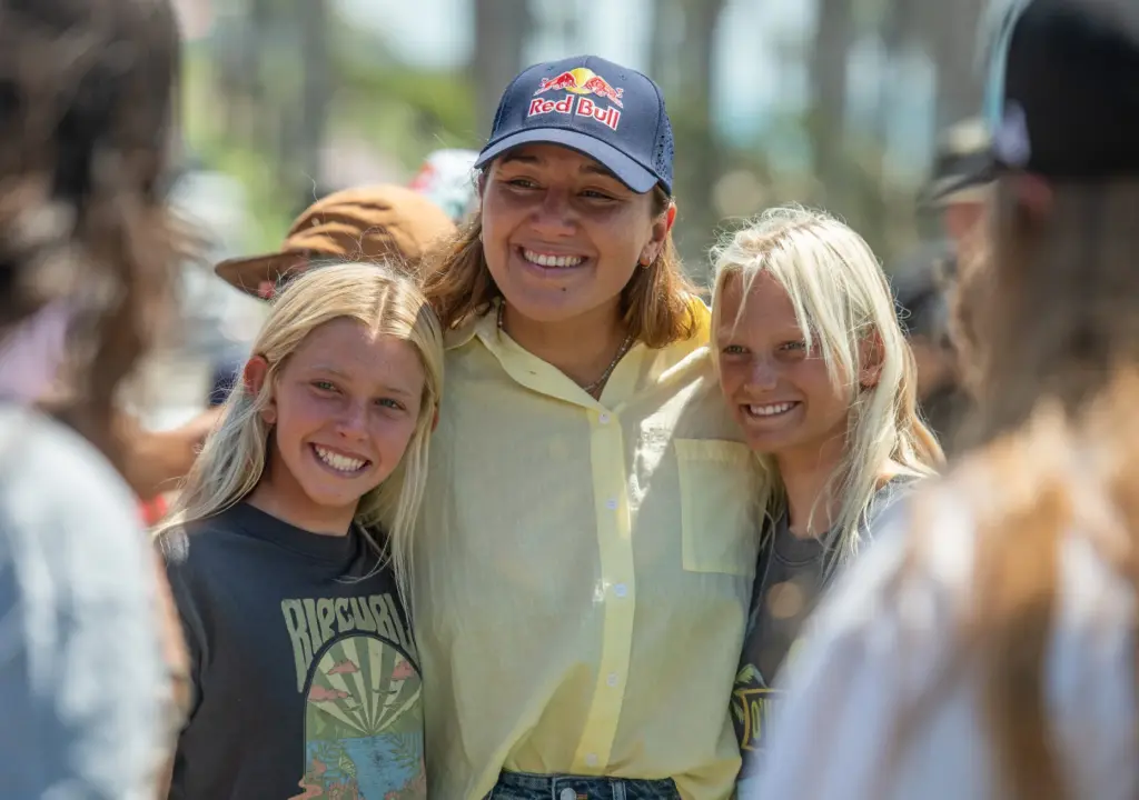 Aspiring surfers Zoe Panettiere, left, 12, of San Diego and...