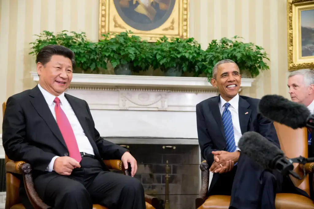 FILE – President Barack Obama meets with Chinese President Xi...