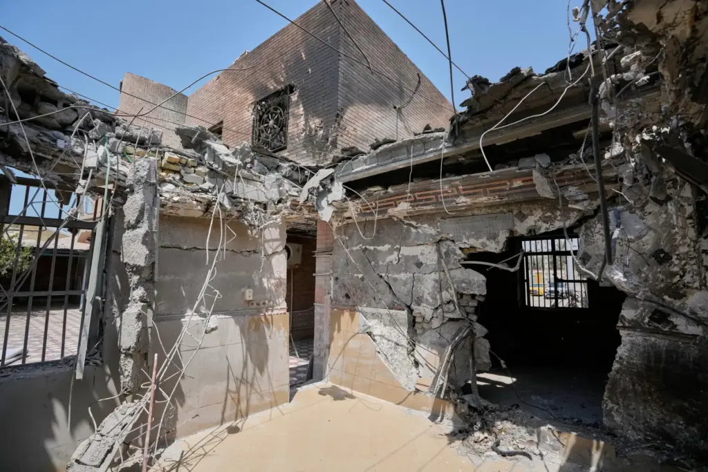 The damaged exterior of a home that Iranian media said...