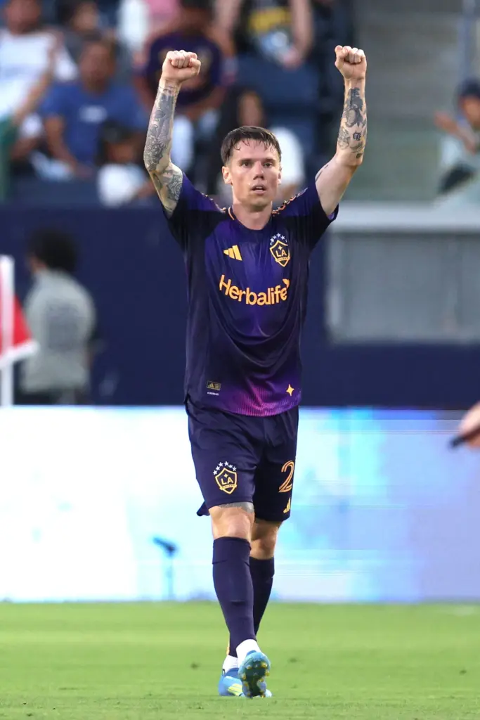 Galaxy forward Robert Taylor celebrates after scoring a goal against...