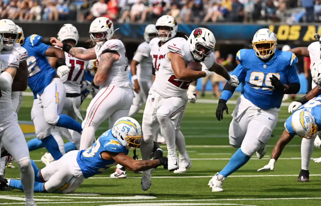 Arizona Cardinals running back Tyler Allgeier (22) runs for a...