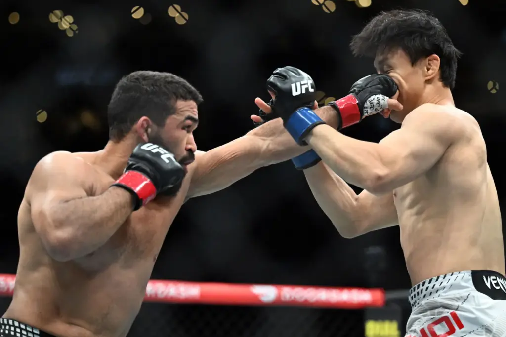 Patricio Pitbull (red) vs. Dooho Choi (blue) during their fight...