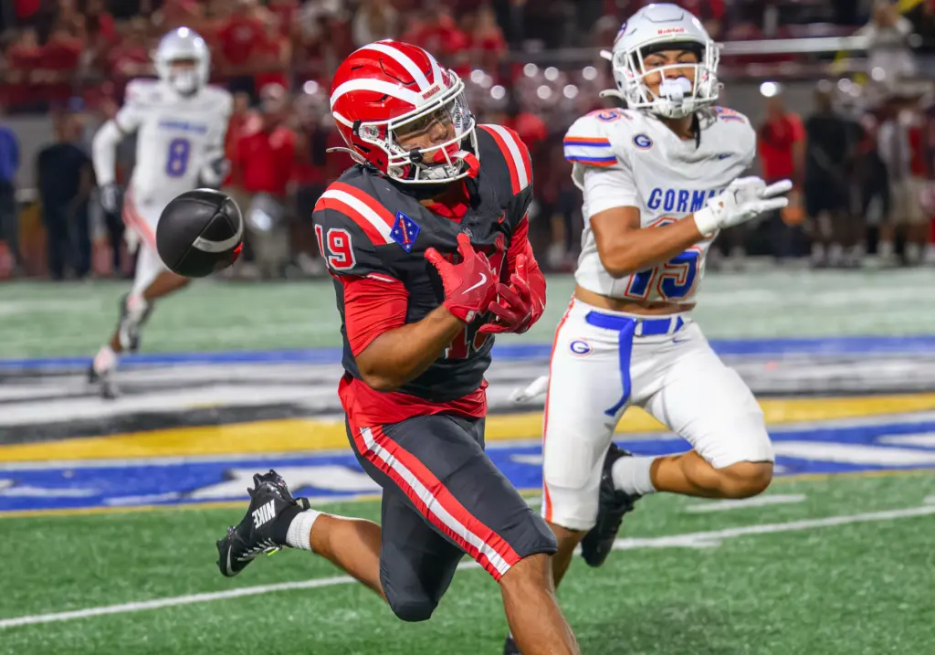 Mater Dei wide receiver Gavin Honore gets out in front...