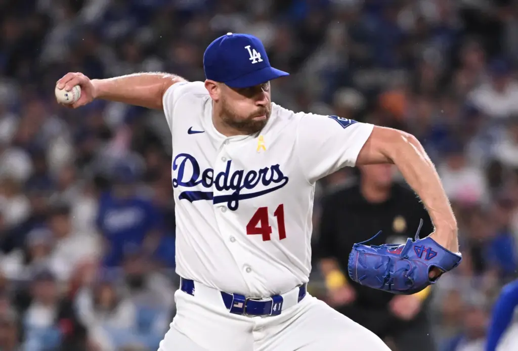 Dodgers relief pitcher Brock Stewart delivers a pitch against the...