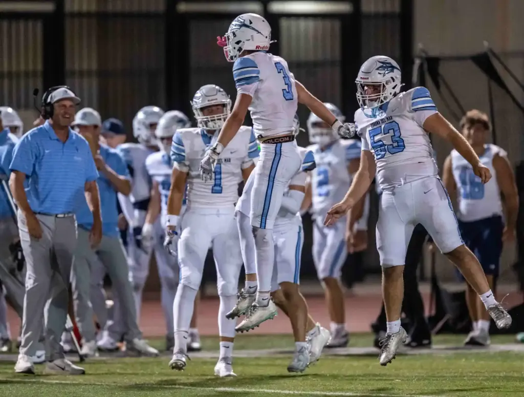Corona del Mar center back Hudson Zinone (3) celebrates with...