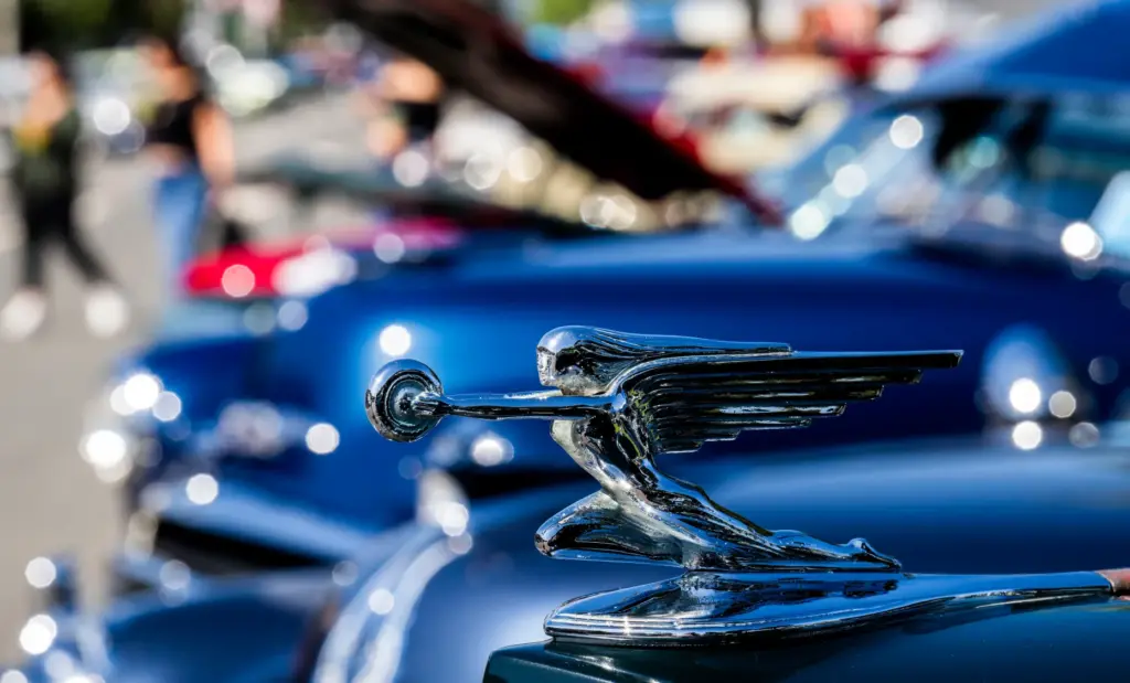 The hood ornament on Teodoro Vidalâs 1937 Packard shines as...