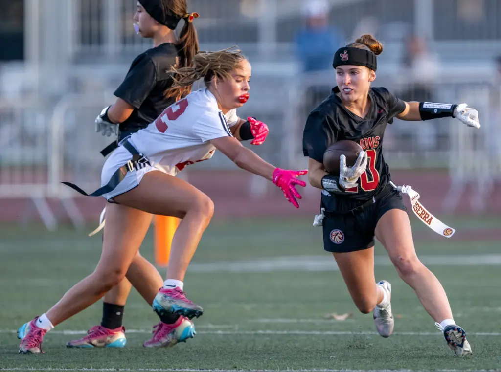 JSerraâs Avery Olson (10) carries the ball during a Trinity...