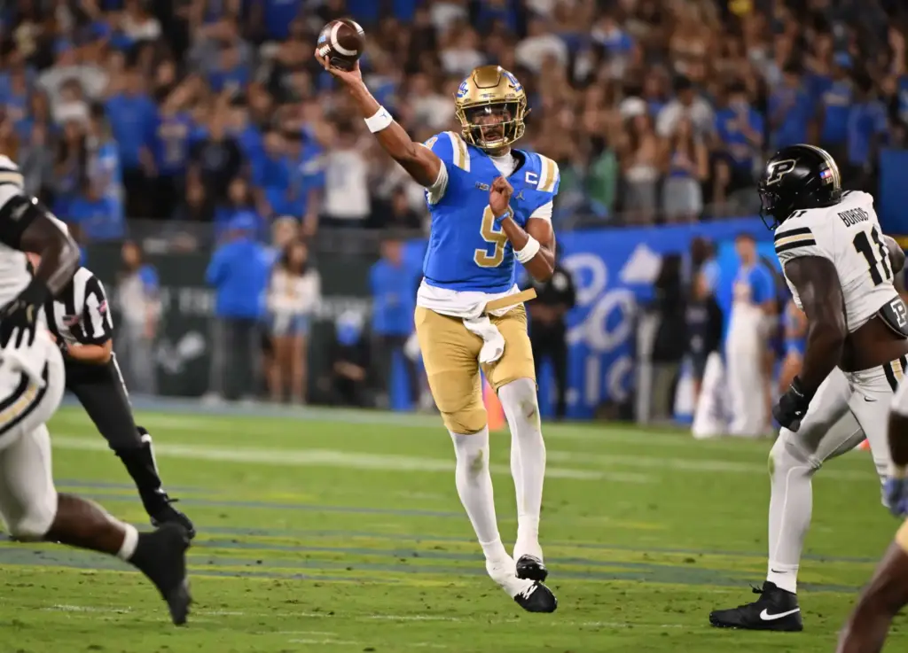 Quarterback Nico Iamaleava (9) of the UCLA Bruins passes against...