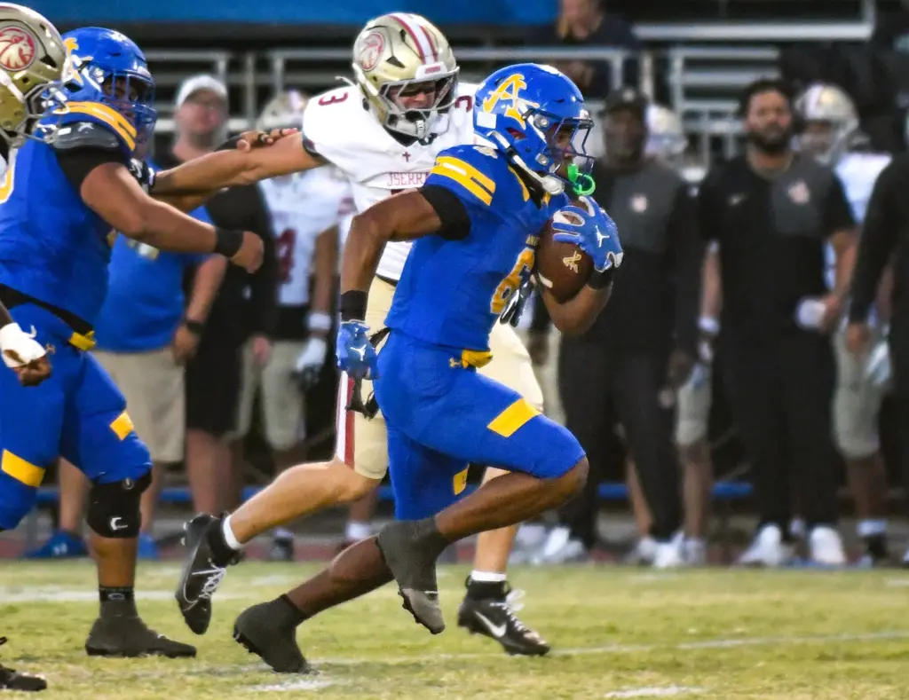 Bishop Amat running back Justin Clinton (6) breaks away for...