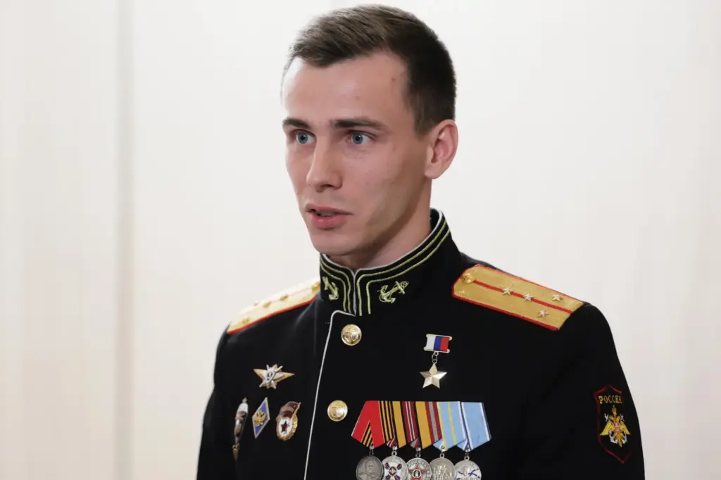 Vladislav Golovin attends a meeting with Russian President Vladimir Putin.