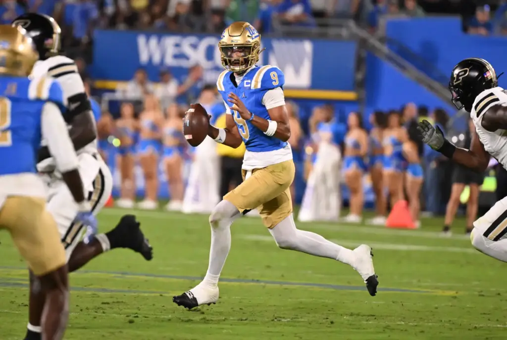 Quarterback Nico Iamaleava (9) of the UCLA Bruins prepares to...