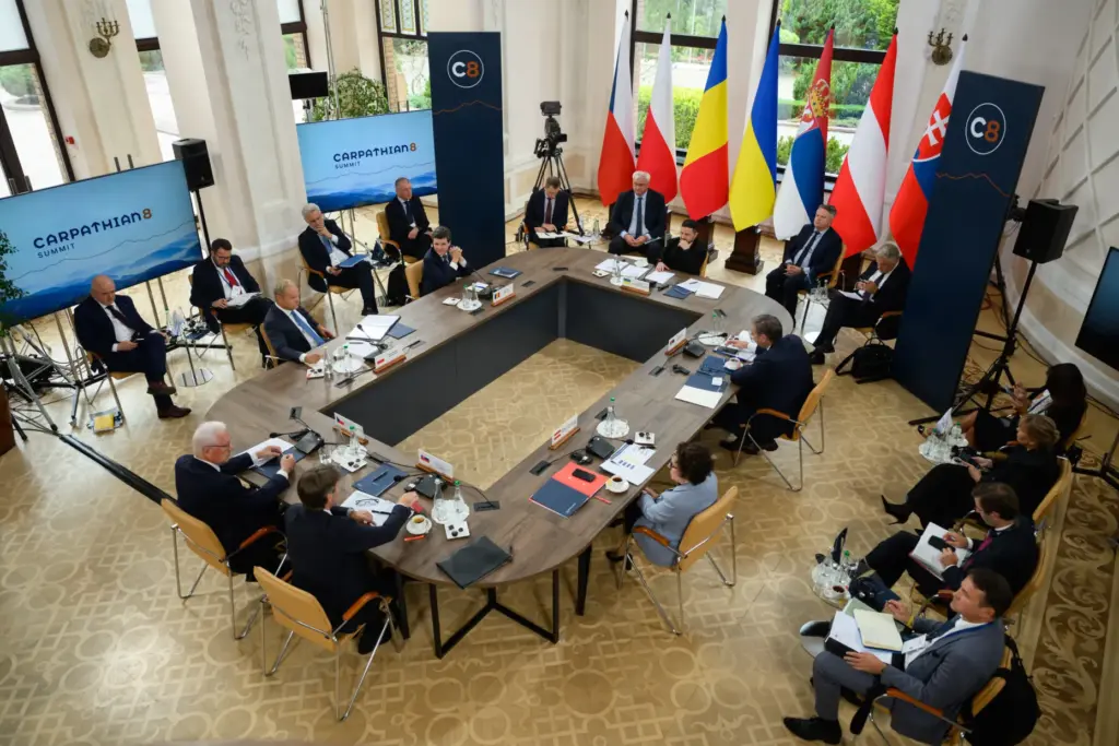 Ukrainian President Volodymyr Zelenskyy and EU officials attend a summit.
