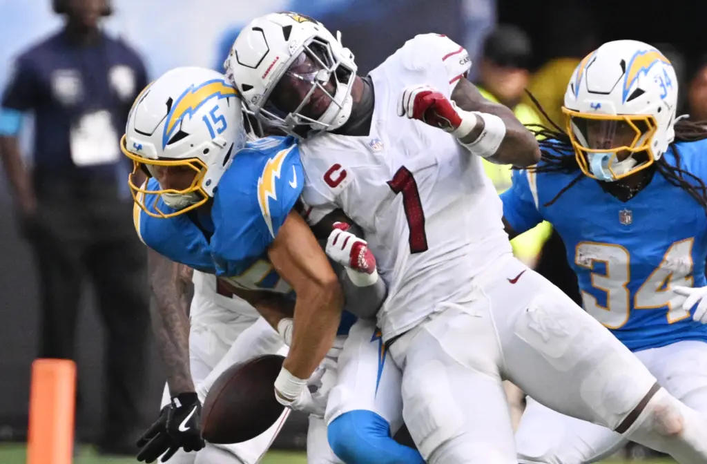Arizona Cardinals linebacker Mack Wilson Sr. (1) knocks away a...