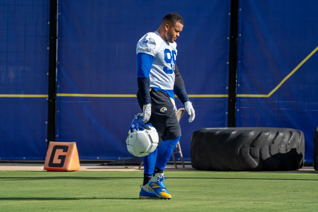 Rams defensive lineman Aaron Donald walks off the practice field...