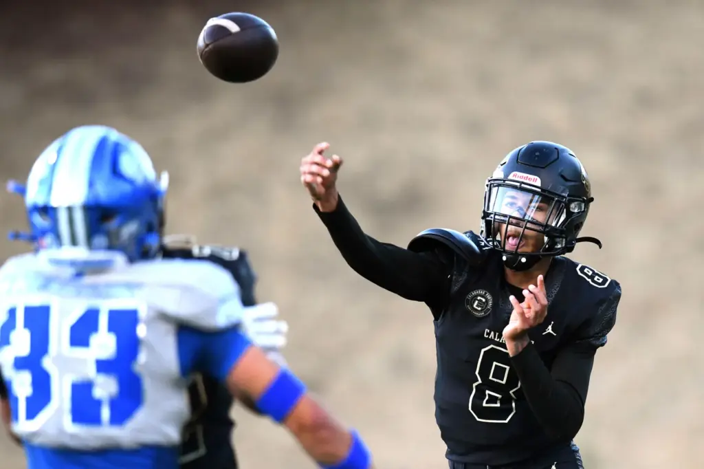Calabasas quarterback Dominik Hardy throws a pass during a game...