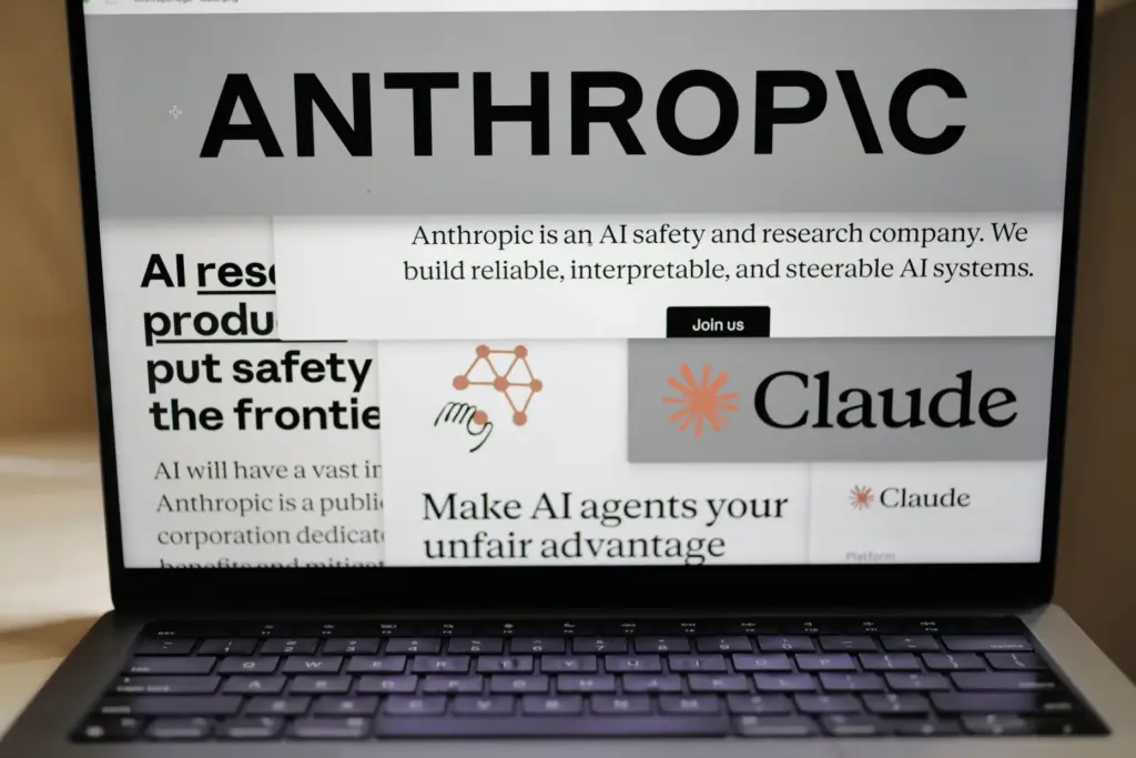 FILE – Pages from the Anthropic website and the company’s...