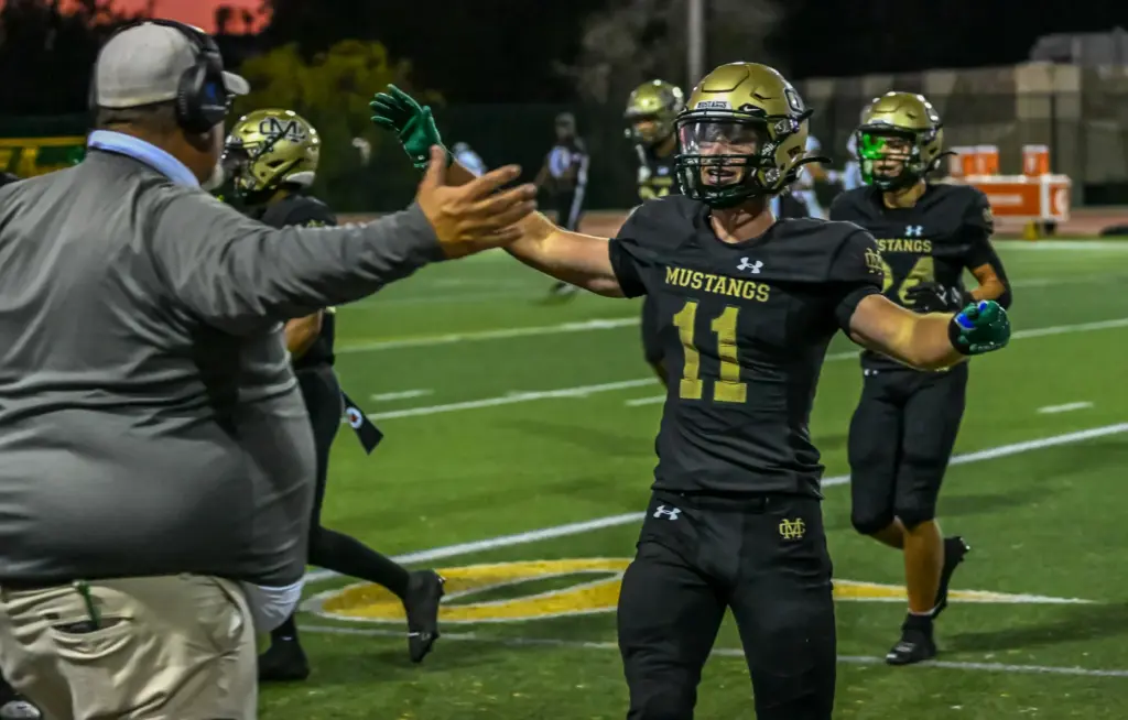 Mira Costa’s Jack Strosnider celebrates getting an interception during the...