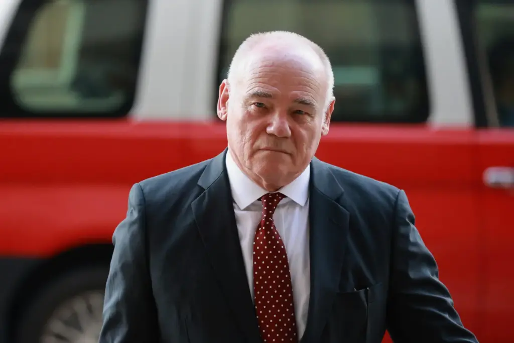 Senior counsel Nigel Kat, for Selina Cheng, arrives at Eastern Magistrates' Court.