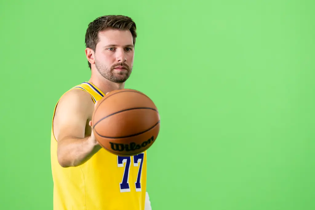 Lakers star Luka Doncic poses for photographs during the team’s...