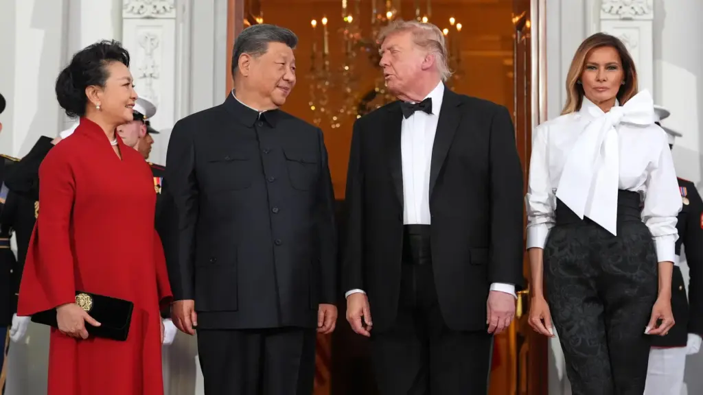 President Donald Trump and Melania Trump greet China's President Xi Jinping and Peng Liyuan.