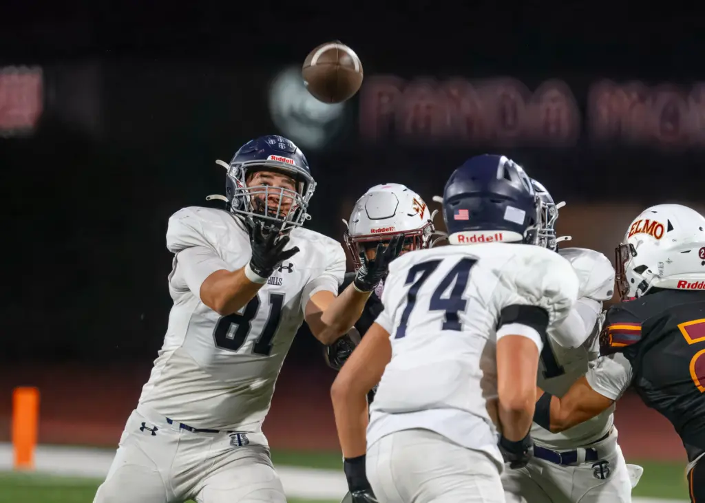 Trabuco Hills tight end Dillan Olson, left, reaches to catch...