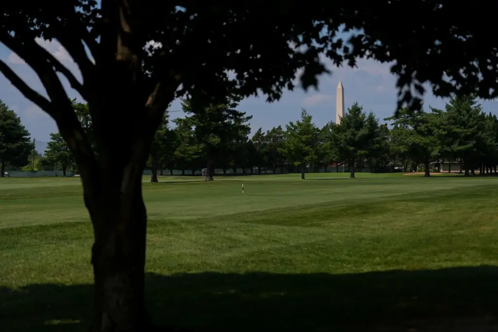 The Washington Monument is seen beyond the East Potomac Park...