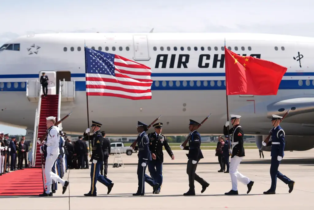 A U.S. Joint Military Honor Guard marches into position before...