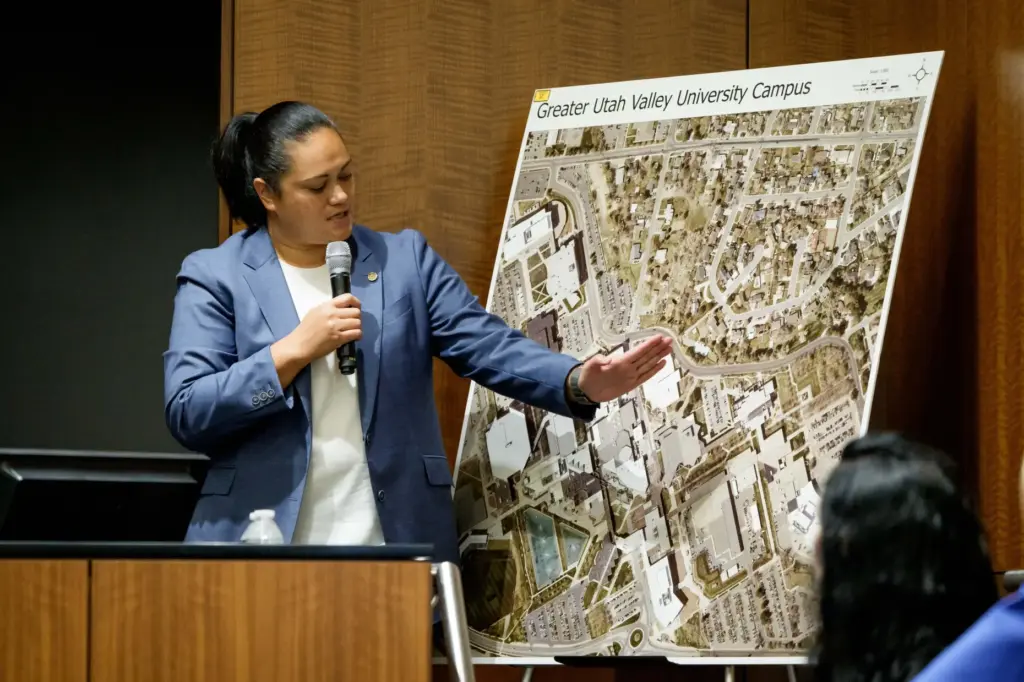 Sgt. Jennifer Faumuina motions toward a map of the Utah Valley University campus.