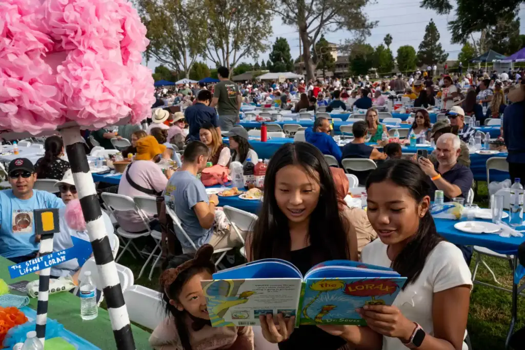 Skylar Kwok, Gemma Kwok, and Ava NuÃ±ez smile while looking...