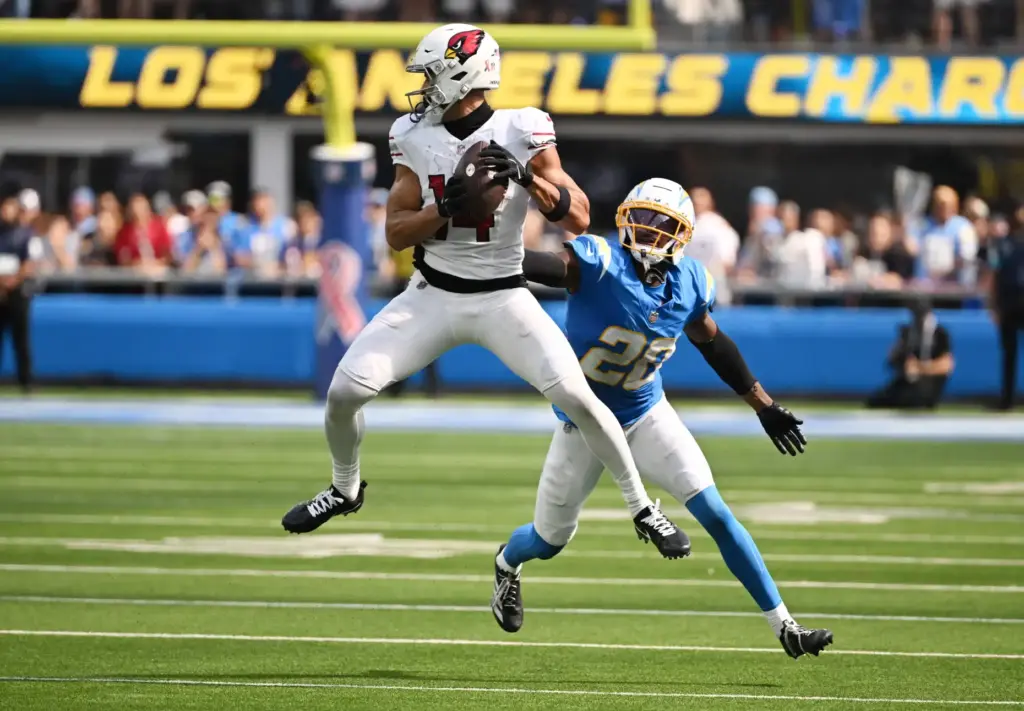 Arizona Cardinals wide receiver Michael Wilson (14) catches a pass...