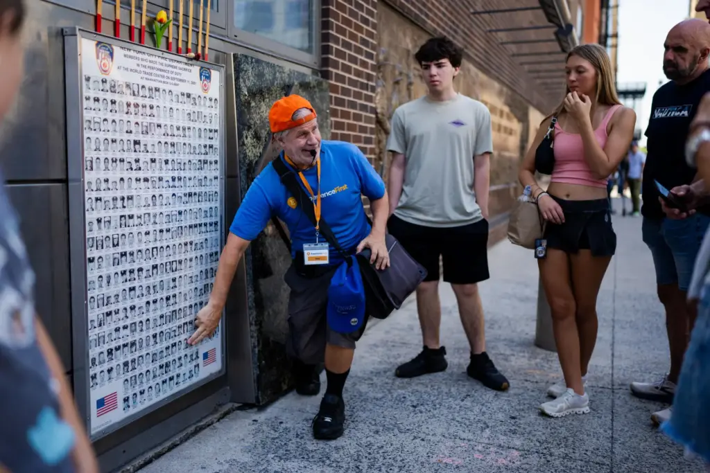 A tour guide talks about Daniel Suhr, the first firefighter to die in the 9/11 attacks.