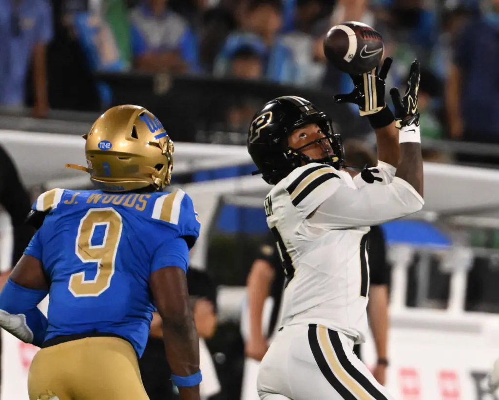 Wide receiver Asaad Waseem (19) of the Purdue Boilermakers catches...