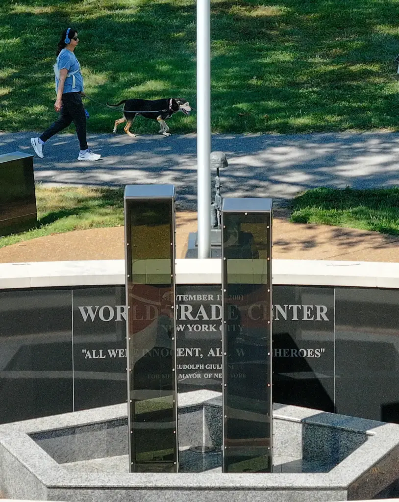 A visitor walks past the Heroes Memorial at Fenton City...