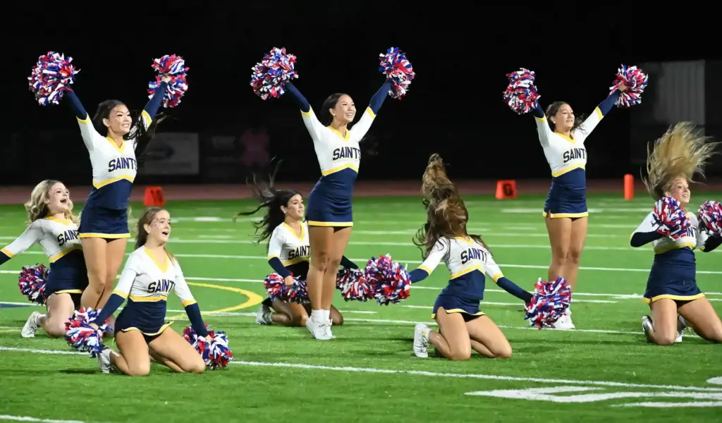 Crean Lutheranâs Cheer squad entertains the crowd during their halftime...