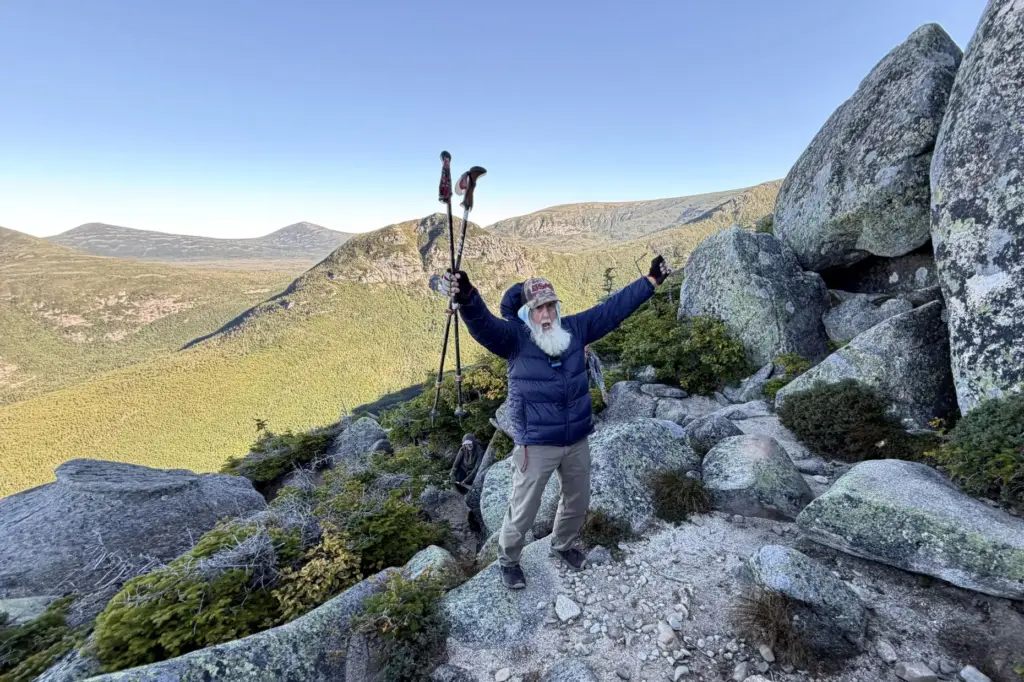 Dale Sanders, 91, celebrates after completing a difficult section of...