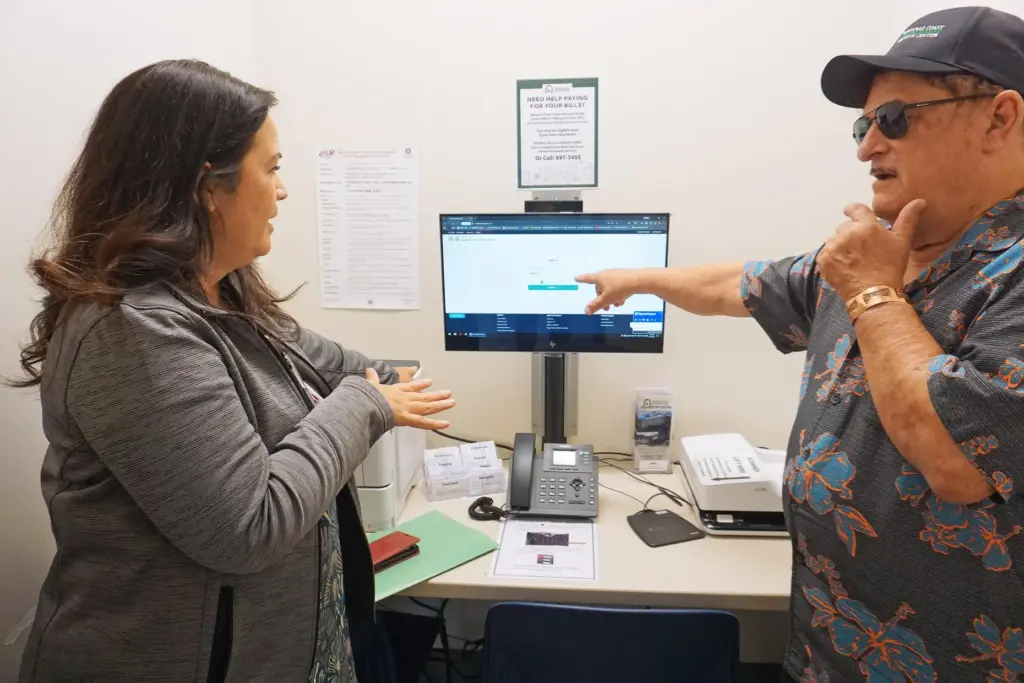Waianae Coast Comprehensive Health Center CEO Rich Bettini (right) and...
