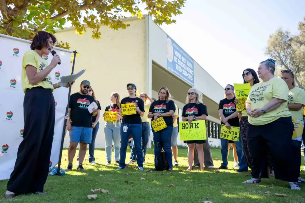 Members and supporters of the Saddleback Valley Educators Association listen...