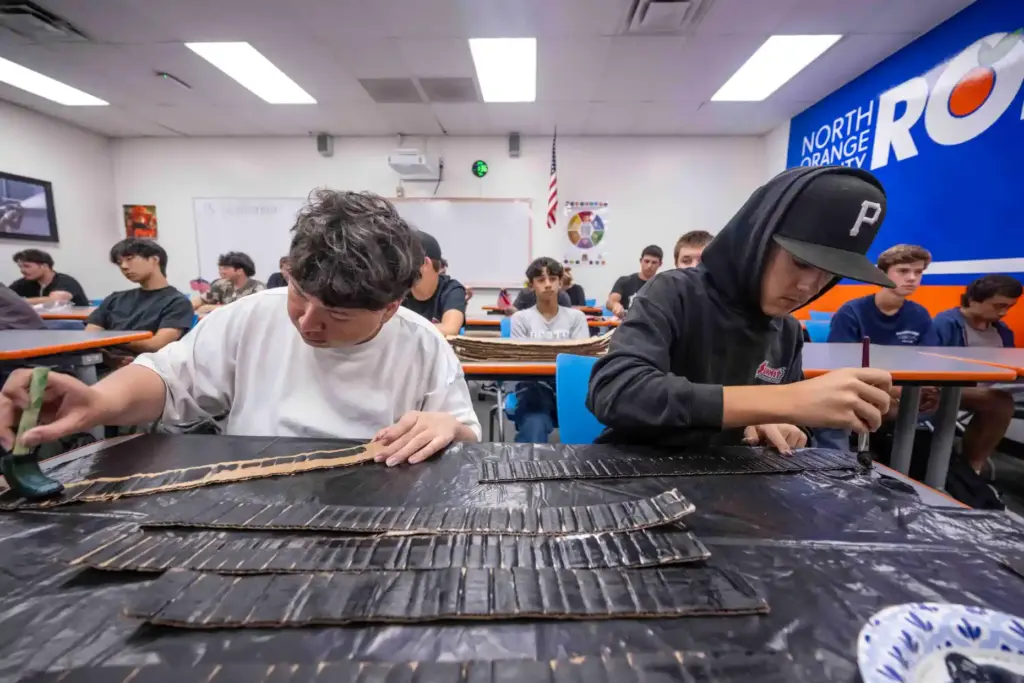 Los Alamitos High School Fire Tech program students John Castillo,...