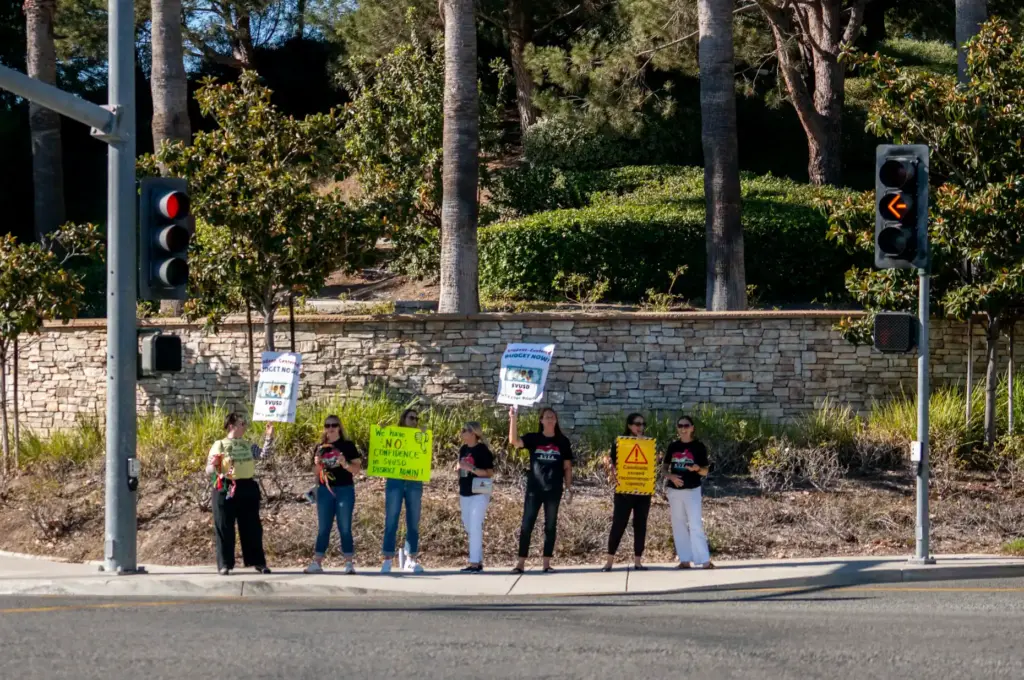 Members and supporters of the Saddleback Valley Educators Association demonstrate...