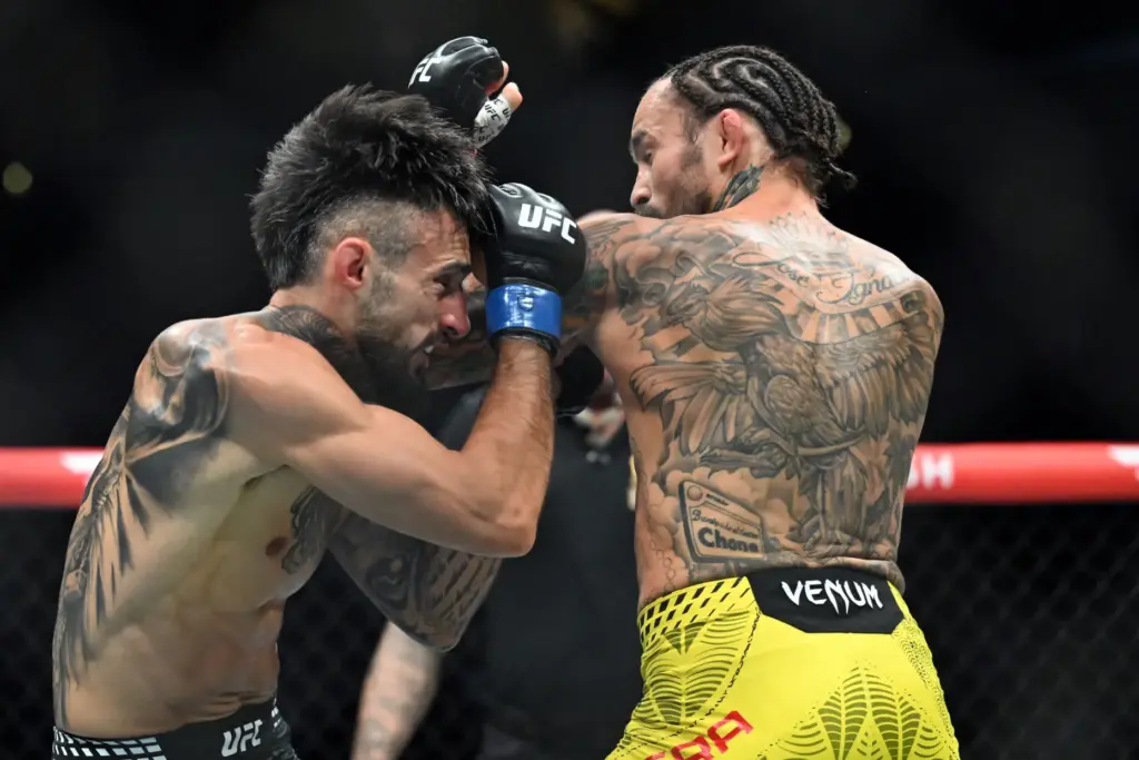 Marlon Vera (red) vs. Charles Jourdain (blue) during their fight...