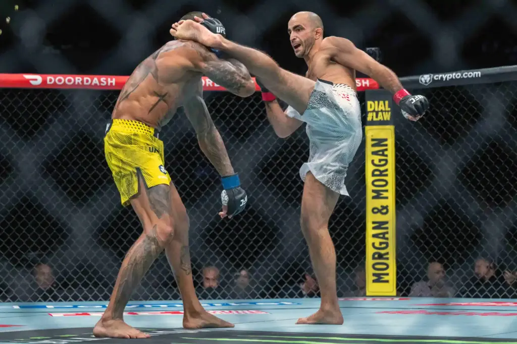 Giga Chikadze (red) vs. Joanderson Brito (blue) during their fight...