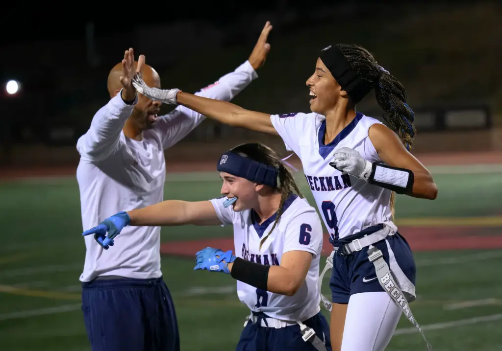 Wide receiver Hayden Freedman, center, and wide receiver Kalaya Long,...