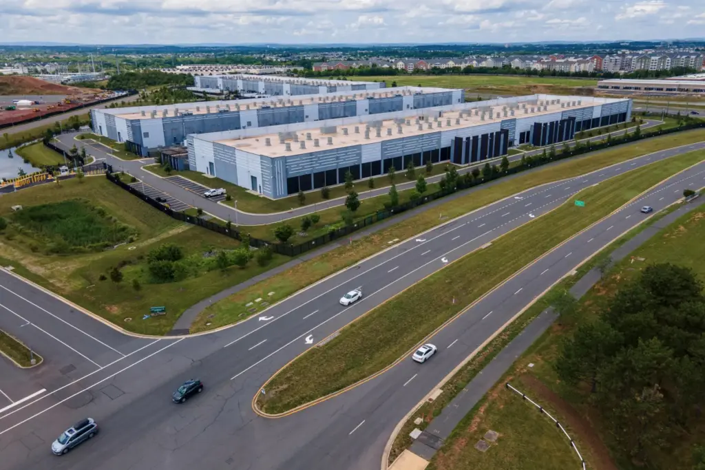 Cars drive past data centers in Ashburn, Virginia.
