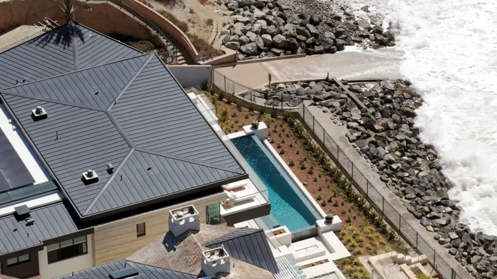 Sited on nearly a third-of-an-acre lot, the house rises three...