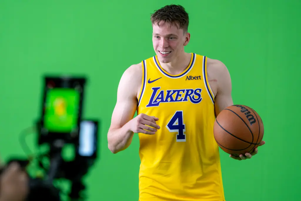 Lakers guard Dalton Knecht poses for photographs during the team’s...