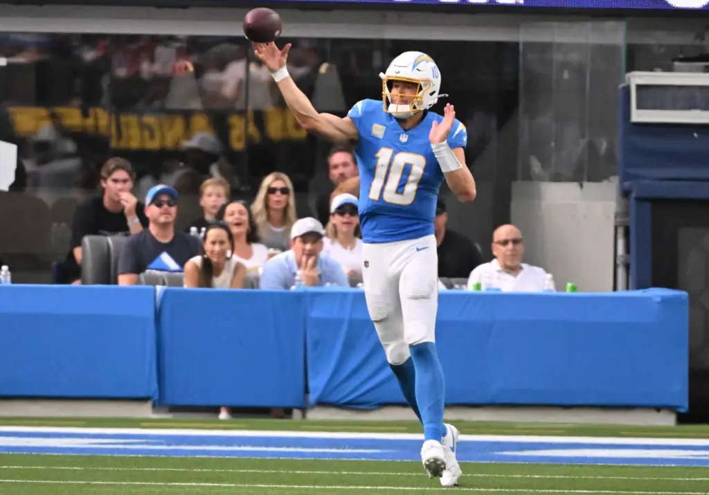 Chargers quarterback Justin Herbert (10) passes against the Arizona Cardinals...